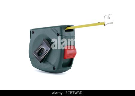 A close-up shot of a green and red tape measure, with the yellow tape extended against a white background, perfect for construction or DIY themes. Stock Photo