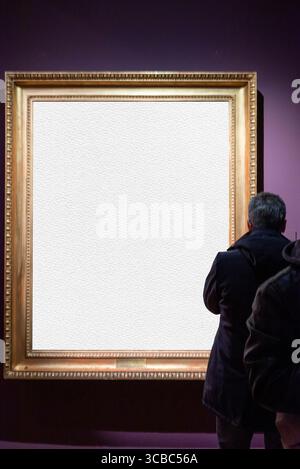 In the showroom with colored walls, frames with empty interiors are displayed. The white interior of the frames allows for the insertion of images or Stock Photo
