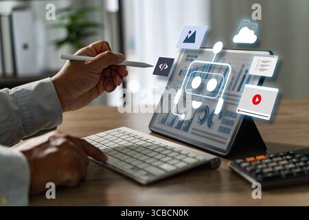 AI-powered web person working tablet with digital icons and graphs, representing artificial intelligence and data analysis, modern office setting Stock Photo