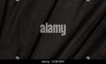 Black wave fabric on isolated. Abstract curved curtian background and copy space. Stock Photo
