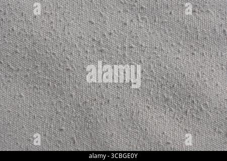 Close-Up of Old Cotton Fabric with Pilling Texture Stock Photo