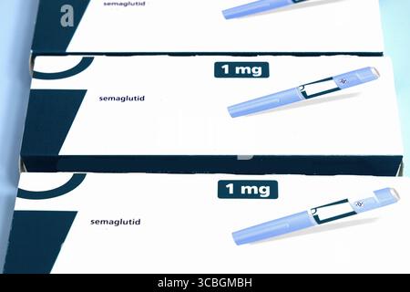1mg semaglutide injection pen boxes on blue background. High quality photo  Stock Photo - Alamy