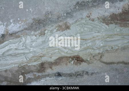 A gray painted background of a concrete wall. Stock Photo