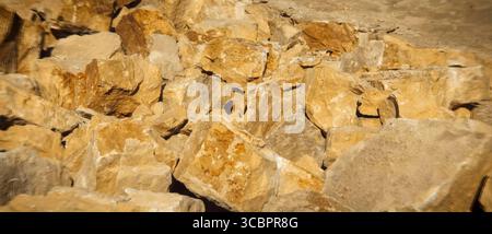 Panorama, extraction of crushed stone from rock, large stones. Stock Photo