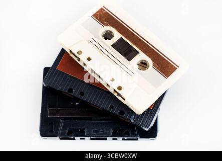 Old Audio Tape Cassettes on the White Background closeup Stock Photo