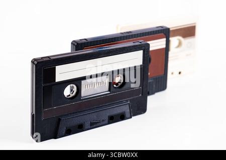 Old Audio Tape Cassettes on the White Background closeup Stock Photo