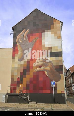 Mural AllerHand Tino Bittner 2024, street art, graffiti, two big hands, coarse pixels, grid, Schlachtermarkt, Schwerin, Mecklenburg-Vorpommern, German Stock Photo
