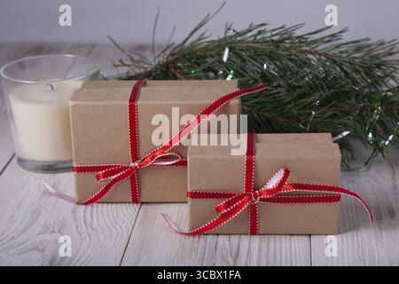 Christmas boxes with gifts on wooden background Stock Photo