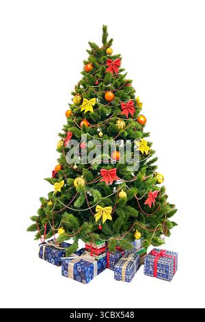 Artificial Christmas fir tree with presents isolated on white background. Home interior with decorated Christmas tree and gift boxes under it Stock Photo