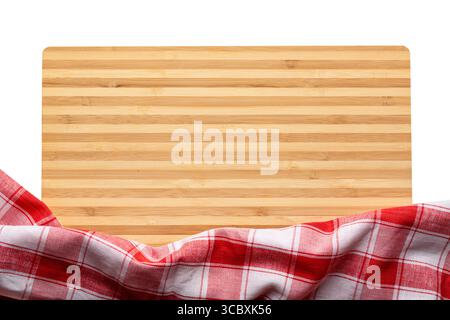 New rectangular bamboo wooden cutting board with red striped towel isolated on white background. Top view. Mock up for food project Stock Photo