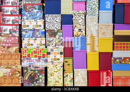 Moscow, Russia - December 27, 2020: A lot of colorful gift boxes in a shopping mall before New Year or Christmas. Stock Photo