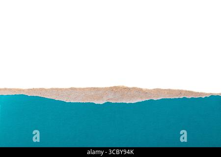 Blue turquoise ripped cardboard paper torn edges isolated on white background. Stock Photo