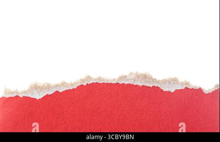 Red ripped cardboard paper torn edges isolated on white background. Stock Photo