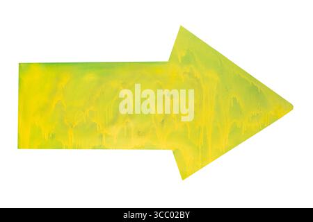 Drawn yellow arrow painted on green wall isolated on white background Stock Photo