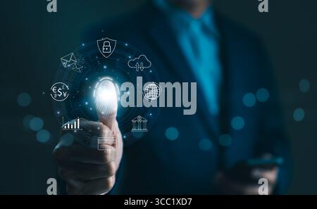 Cybersecurity concept. Businessman using thumb to scan fingerprint or for digital processing biometric identification to access security system includ Stock Photo