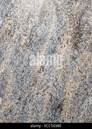 Abstract background with a blue, gray, and beige stone texture. Ideal for design, surface finishing, countertops, and decorative panels. Stock Photo