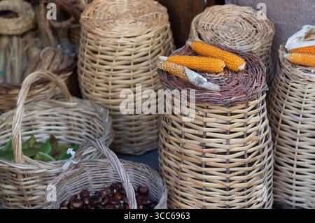 handmade wicker baskets made from corn cobs and chestnuts Stock Photo