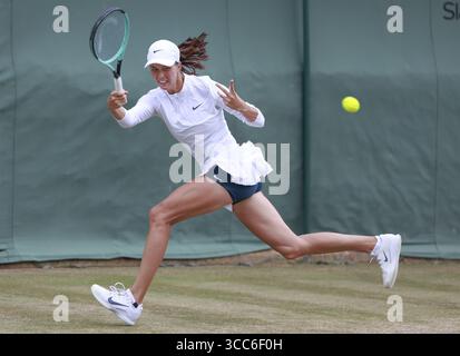 L Tagger Lilli Tagger (AUT) in action against Paula Badosa (ESP) at the WTA ...