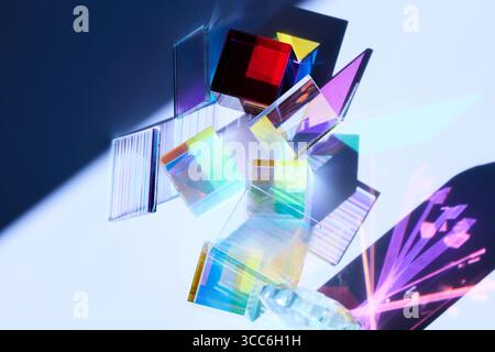 Prismatic Reflections. Colorful glass prisms casting vibrant shadows and reflections Stock Photo