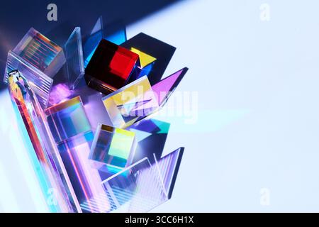 Colorful Prism Blocks. Abstract composition of colorful glass prisms casting vibrant shadows Stock Photo