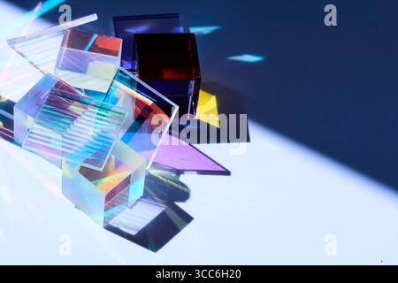 Prismatic Reflections. Colorful glass prisms casting vibrant shadows and reflections Stock Photo