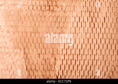 Sliced brown paper for packaging. Using recyclable materials concept. Background, texture. Selective focus. Stock Photo