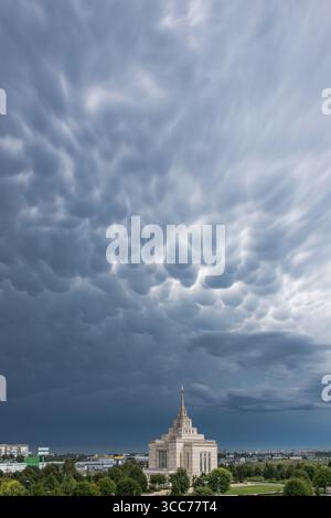 Stormy sky. Nature mood. Beautiful dramatic sky after a storm. Cumulus blue clouds after a thunderstorm. Gloomy sky landscape. Gothic style. Stock Photo
