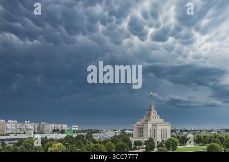 Stormy sky. Nature mood. Beautiful dramatic sky after a storm. Cumulus blue clouds after a thunderstorm. Gloomy sky landscape. Gothic style. Stock Photo