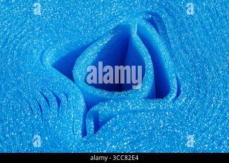 Blue polyethylene edge foam tape roll. Professional building materials Stock Photo