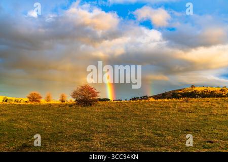 Rainbow over the countryside at Blayney in the Central West of NSW, Australia. Stock Photo