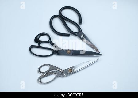 Fabric scissors, in various shapes isolated on white background. Stock Photo