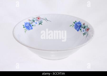Empty floral patterned bowl isolated on white background. Stock Photo