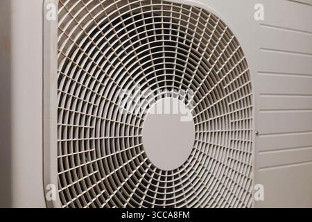 White housing of the outdoor unit of the air conditioner. Stock Photo