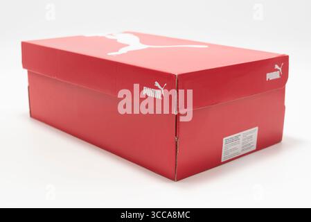 Red box of PUMA Men's Deviate Nitro 2 running shoes, isolated on white background. Stock Photo