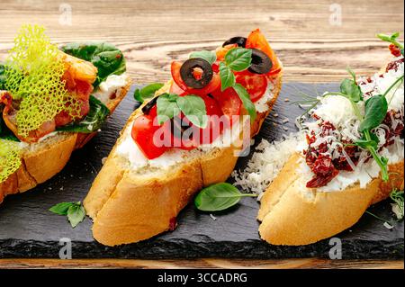 bruschetta with tomatoes, olives and basil Stock Photo