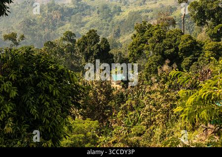 Layered mountain ridges fading into clouds Stock Photo