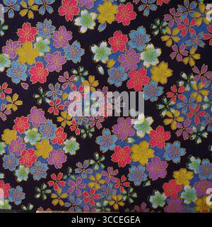 Traditional Japanese Floral Pattern on Dark Fabric Stock Photo