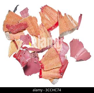 A pile of different sized shavings from sharpened colored pencils. The wooden parts and bright red and pink remains of the leads are visible. Isolated Stock Photo