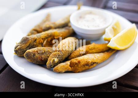 Fried sea fish goby and red mullet Stock Photo