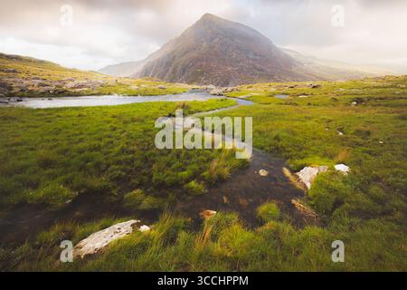 Dramatic landscape of Cwm Idwal in the Gyderau mountains of Snowdonia National Park in North Wales. Stock Photo