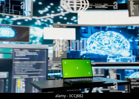 Laptop running isolated mockup screen next to AI neural networks system, used for practicing deep learning and cloud computing. Tech implementing artificial intelligence brain. Stock Photo