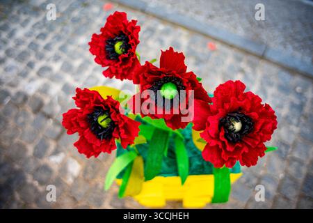 Red paper carnations from the paper flower festival. red paper carnations from the paper flower festival organized by the town of Redondo-Évora-Portug Stock Photo