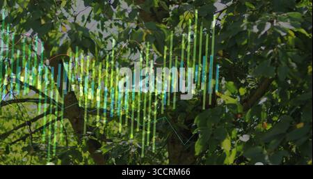 Displaying translucent vertical bar and line chart overlay amid garden green leaves and branches Stock Photo