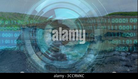 Displaying circular digital interface overlay floating above rocky inlet, with binary code streams Stock Photo