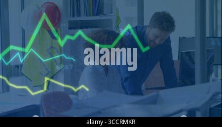 Collaborating office professionals reviewing plans in office workspace with helmets and line graphs Stock Photo