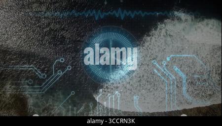 Circular HUD floating over coastal sea, showing breaking waves with circuit lines, waveform overlay Stock Photo