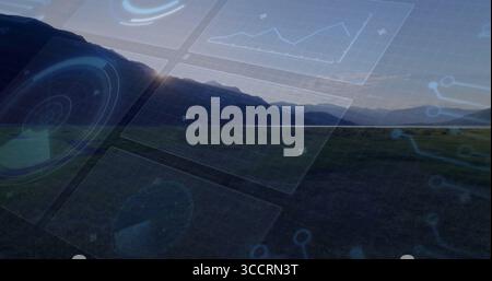 Displaying interface panels overlaying mountain valley dusk, with radar, charts, nodes, markers Stock Photo