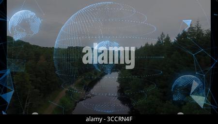 Hovering wireframe globe floating over forest river path, with data points and network shapes Stock Photo