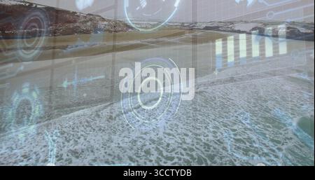 Displaying circular HUD overlaying sandy coastline, with radial chart, waveform, bar chart overlays Stock Photo