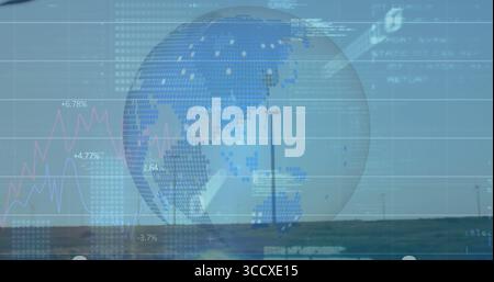 Displaying semi-transparent globe hovering over grassy plain, with line charts and wind turbines Stock Photo